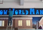 Craftsman installing Snow World illuminated 3D channel letters